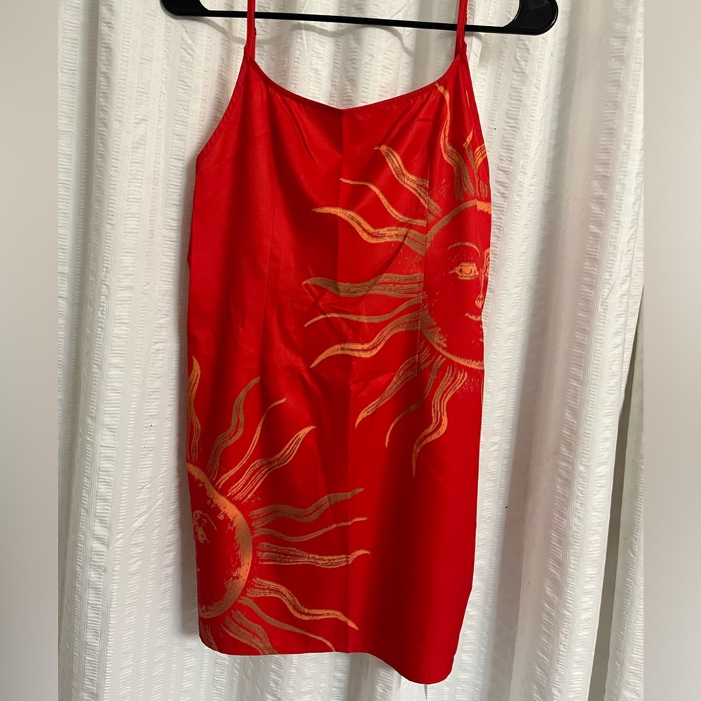 Musera size small red and gold mini dress!